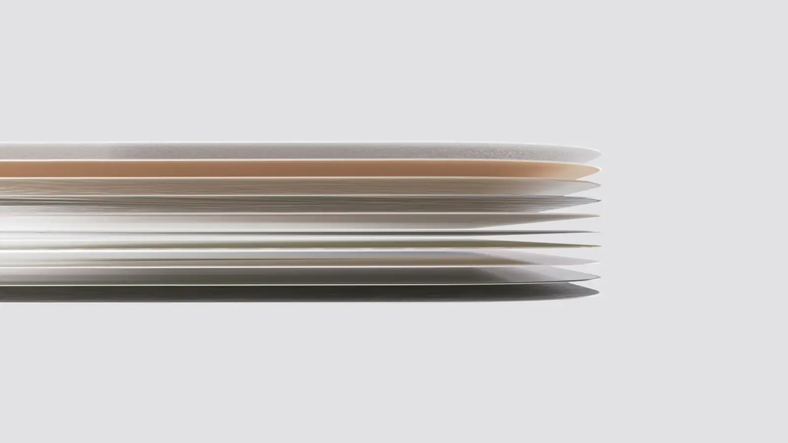 Macro shot from the keynote of the foldable's display layers fanned out in a stack