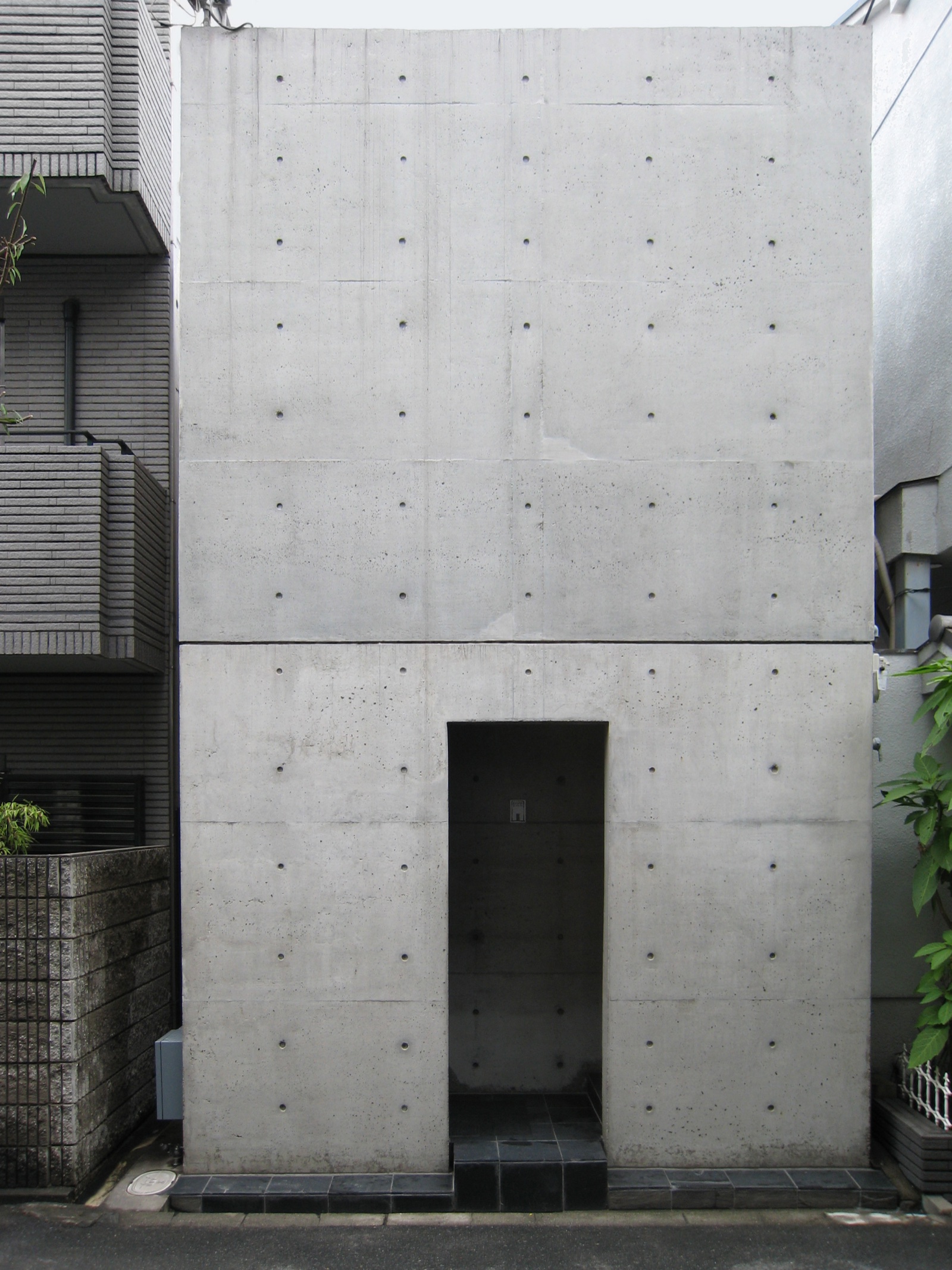 The Azuma House in Sumiyoshi, Osaka -- Tadao Ando's concrete box inserted into a row of traditional nagaya houses