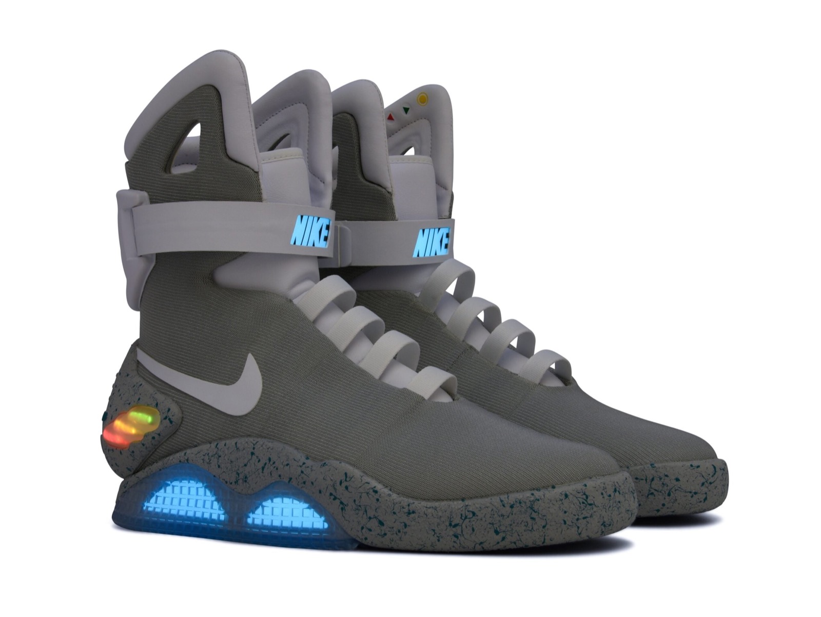 Par Nike MAG "Back to the Future", mostrando o cabedal cinza, as tiras de tornozelo Nike e a sola iluminada