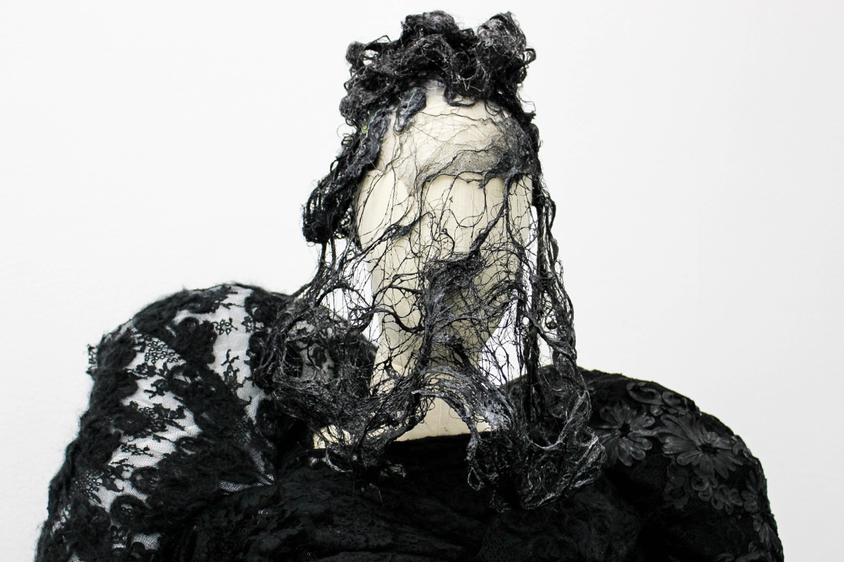 Comme des Garcons piece in shredded black lace and veil, detail, at the Met's Art of the In-Between
