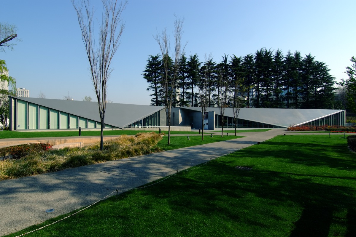 21_21 Design Sight, Tokyo: Tadao Ando's folded steel roof planes descending to the garden