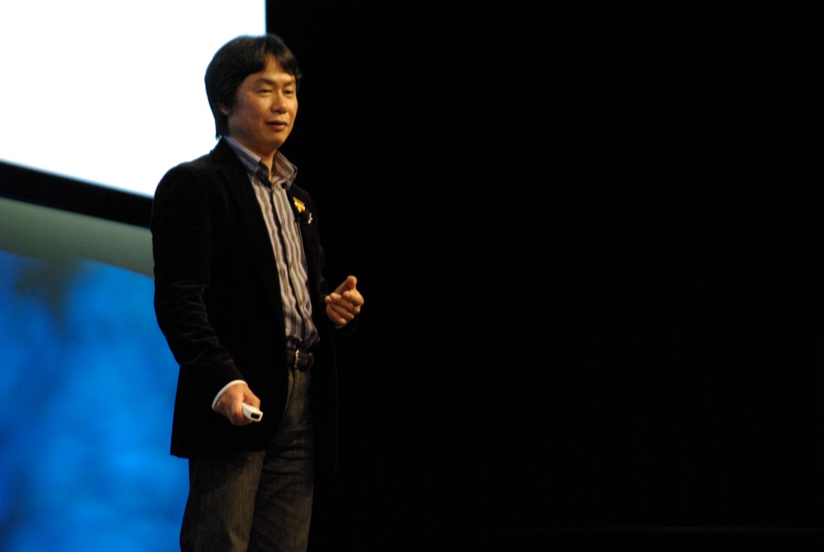 Shigeru Miyamoto on stage at GDC 2007, Wii Remote in hand