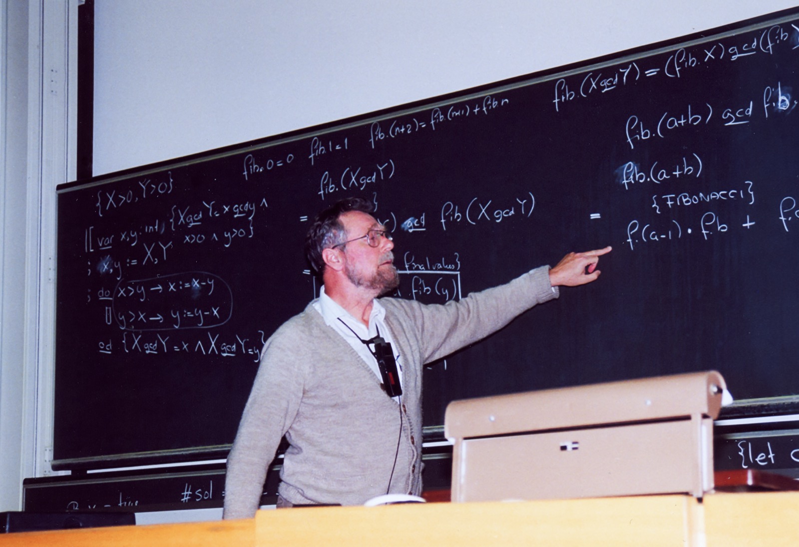 Edsger Dijkstra lecturing at a blackboard