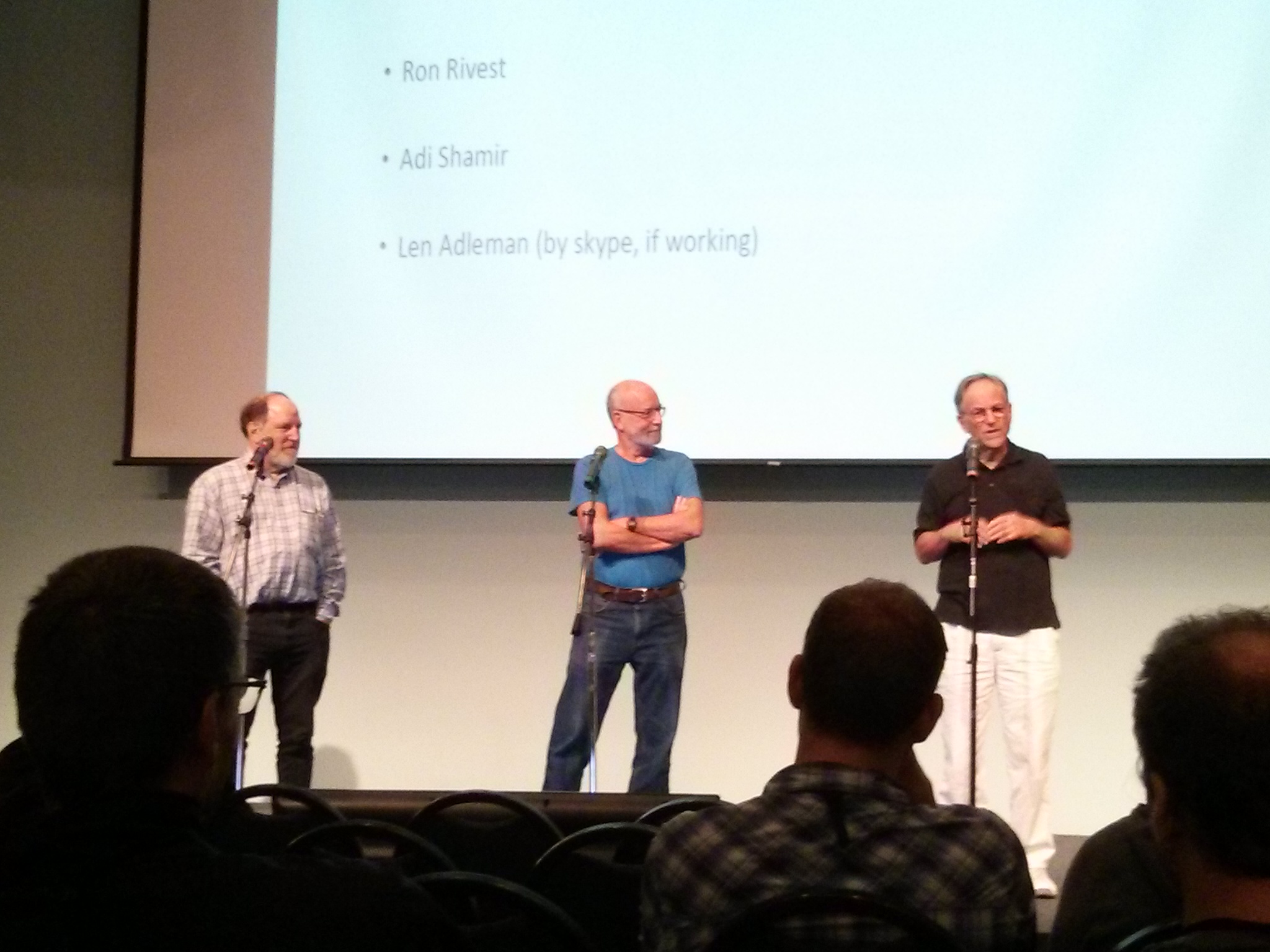 Adi Shamir on stage with Ron Rivest and Leonard Adleman at CRYPTO 2017